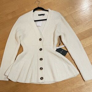 Women's Ivory Ribbed Peplum Cardigan